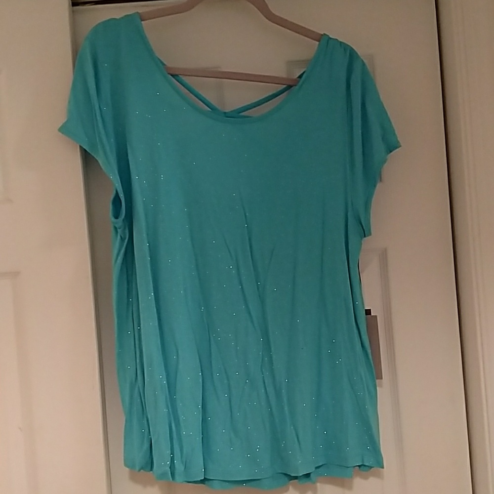 Blue, sparkling , loose fitting top.